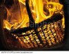 germany-hessen-frankfurt-close-up-of-flames-from-burning-straw-basket-with-wood.jpg