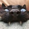 creepy-cat-fangs-metal.jpg