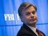 Christopher-Wray-over-shoulder-FBI-background-getty-640x480.jpg