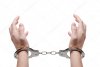 depositphotos_4697094-stock-photo-handcuffs-on-hands.jpg