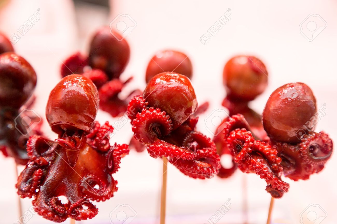 Baby Marinated Octopus On A Stick. Japanese Delicacy At A Tokyo.. Stock  Photo, Picture And Royalty Free Image. Image 66439700.