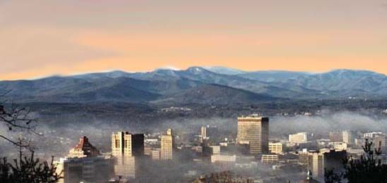 Winter view of Asheville, NC downtown and the surrounding Blue Ridge  mountain ridges with snow. | North carolina mountains, Mountain city, Blue  ridge mountains