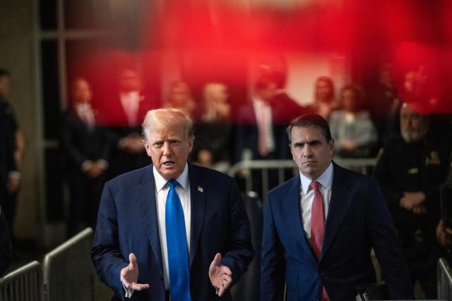 NEW YORK, NEW YORK - APRIL 22: Former U.S. President Donald Trump speaks to the media, flanked by lawyer Todd Blanche (R), after arriving for his trial for allegedly covering up hush money payments at Manhattan Criminal Court on April 22, 2024 in New York City. Trump was charged with 34 counts of falsifying business records last year, which prosecutors say was an effort to hide a potential sex scandal, both before and after the 2016 presidential election. Donald Trump's unprecedented criminal trial is set for opening statements after final jury selection ended Friday. (Photo by Victor J. Blue - Pool/Getty Images)